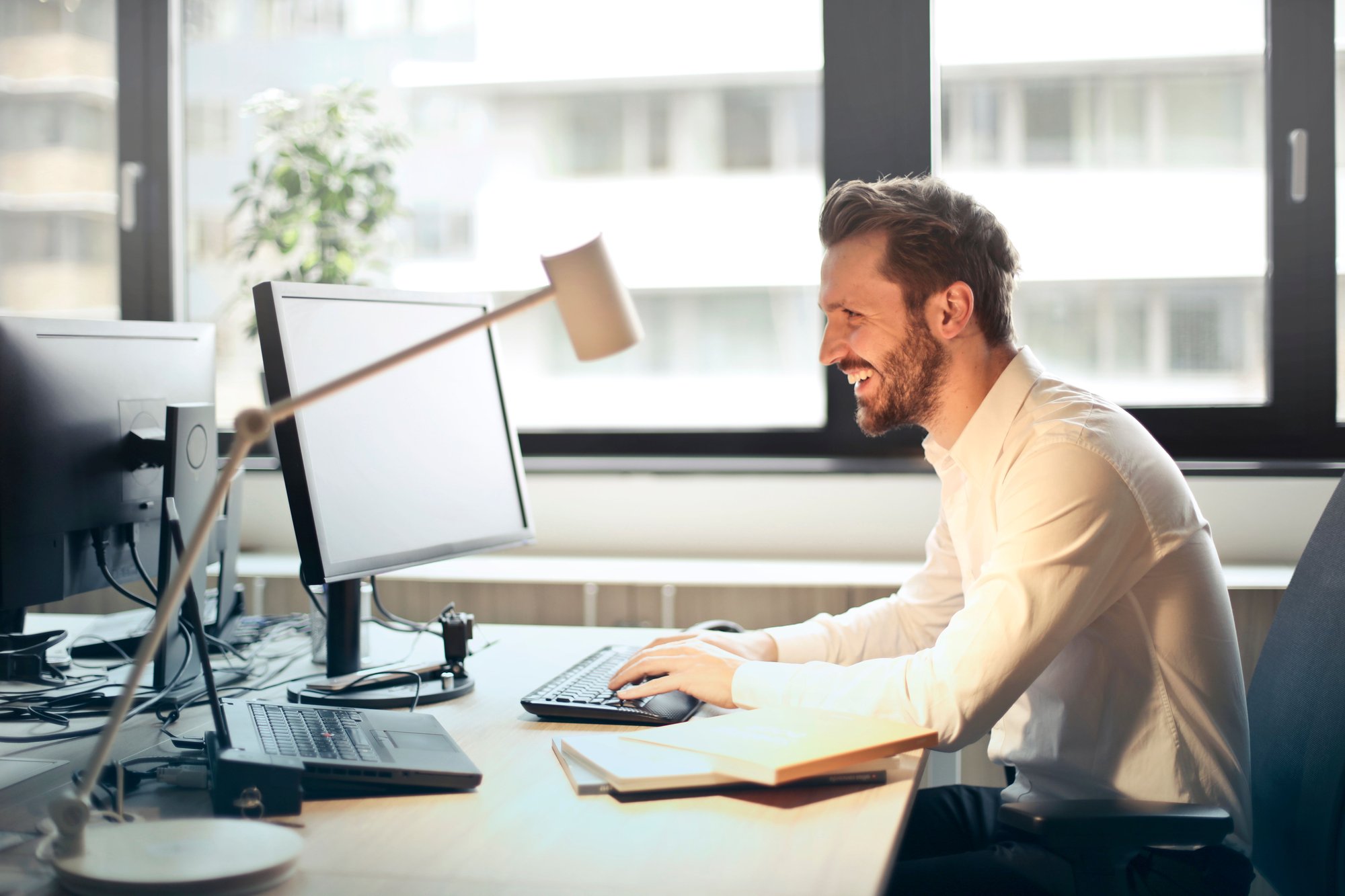 business owner looking at screen relieved